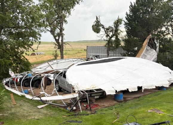 A tornado that hit Aaron and Liza Simonson’s place last Tuesday demolished their tarp building. Liza Simonson