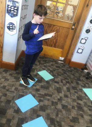 Second graders play Mathland