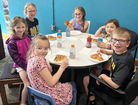 Clockwise around table from top left: Fallon Lee, Avery Vinton, Quinley Schmid, Cooper Ourada, Anna Hessin, Ryhme Pettit. Brett Mauler