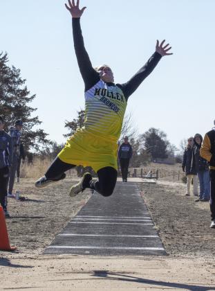 Justin French competing in the long jump last week.