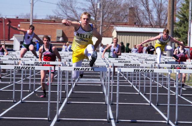 Clayton Moore and Chase Gracey (right) placed 1st and 3rd in both of the boys’ hurdle events last Thursday. Here they compete in the 110 hurdles. Barb McIntosh