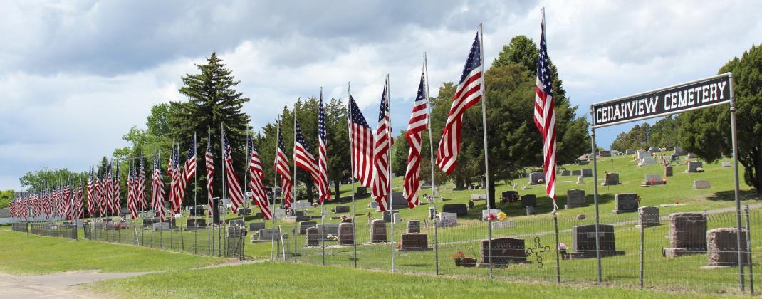 The flags flying at Cedarview Cemetery in Mullen over Memorial Day weekend. Every flag flown was once on a veteran’s casket, with the name of the veteran sewn on to the seam of the flag. Gerri Peterson