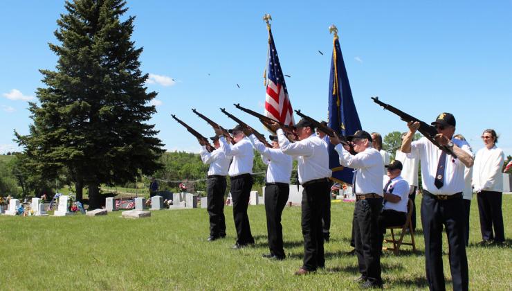 The gun shells fly during the gun salute at the final tribute of the Memorial Day program. Dane Peterson
