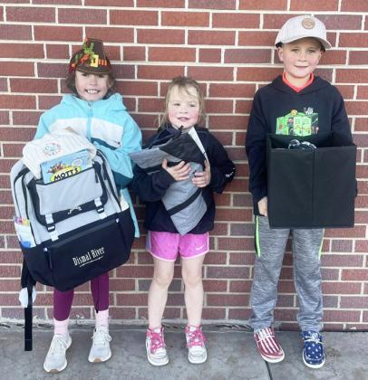 Mile prize winners, l-r: Addison Mundorf (4th), Beckett Wright (5th) and Tate Phillips (1st). Tate, Johnny and Cooper Phillips placed 1st-3rd and shared a prize.