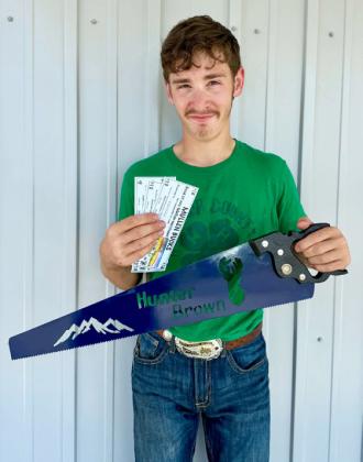 Hunter Brown with his People’s Choice saw. Carolee Brown
