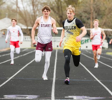 Alex Werner on his way to a gold medal in the 400. Megan Andersen Photography