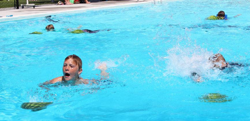 Gus Wingebach edged out Collin Donohoe to win the 9-11 year old Watermelon Race. Gerri Peterson