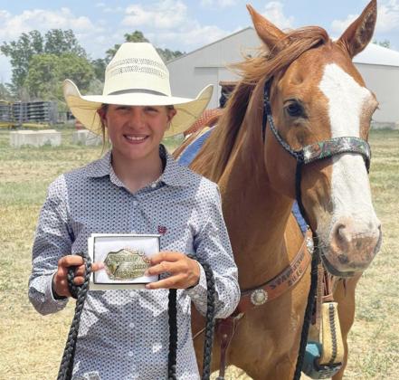 Brynne McCully with her All Around buckle in North Platte. Traci McCully