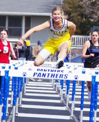 Samantha Moore on her way to the gold medal in the 100 meter hurdles at Hershey last Saturday.