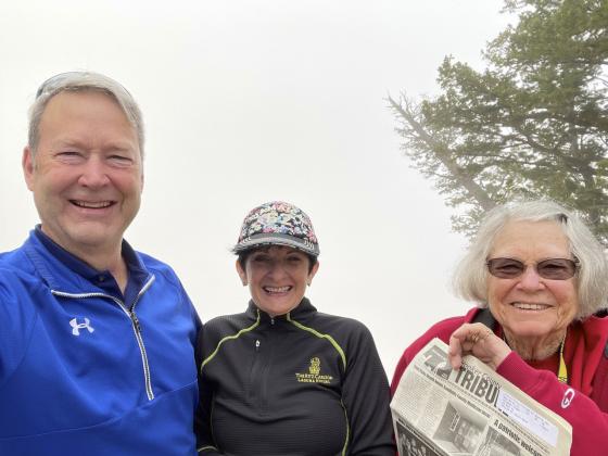 During the first week of the RV trip, Tom kept informing Mildred that the most scenic location to get a picture with the Tribune would be Bryce Canyon National Park, and they burst out laughing when they arrived early morning to Bryce Canyon being fogged in.