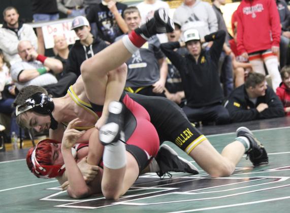 Jacob Wingebach during the match he won for his first ever win last Saturday, with some of his teammates in the background.