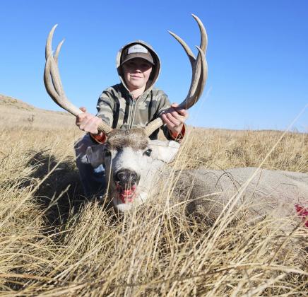 Jedd Kraus with his first deer.