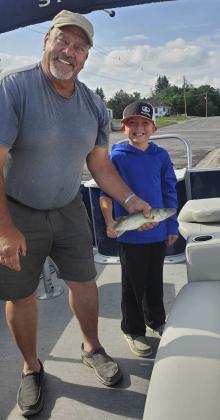 Bryan Crisp and grandson Riggin Hollenbeck