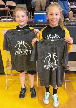3rd/4th grade knockout runner-up Elle Gracey (left) and champion Emri Dent.