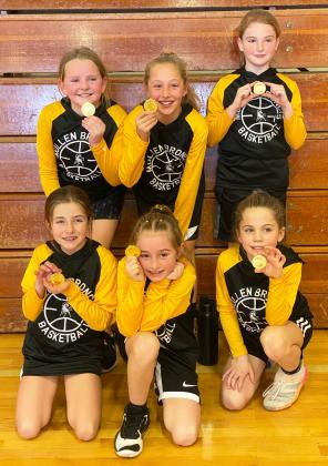 This team of 3rd graders won the Hoops in the Hills 3rd/4th grade girls tournament. (Mullen’s 4th graders played up on the 5th/6th grade team so they would have enough to play.) Pictured back, l-r: Ella Walz, Emri Dent, Elle Gracey. Front: Lillian Ericksen, Avery Vinton, Abbigail Mundorf.