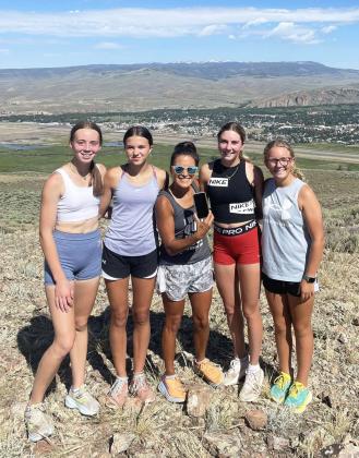 The Mullen High School cross country team had the Tribune with them while running W Mountain at High Altitude Distance Camp in Gunnison, Colorado, in July. Pictured l-r: Harper Andersen, Ady Hampton, Coach Janie Kuncl, Peyton Paxton, Riley Hegland. Photo by the other Mullen runner, Kyle Finney.