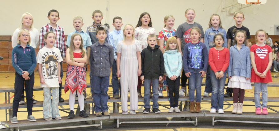 The second and third graders sang “The Brave.” Pictured back, l-r: Daryl Deibler, Marcus Lattin, Killian Kearns, Grady Phipps, Holt Morrison, Zandra Hebbert, Marki Finney, Tatum Deibler, Sadie Hoyt, Eli Barnes. Front: Fallon Lee, Dailie Dent, Eve Ericksen, Tru Mundorf, Danielle Peterson, Trent Cox, Nora Pohot, Aislynn Connealy, Abigail Gonzalez, Ellie Licking, Anna Hessin.