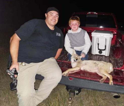 Jason and Lane Brown with their first coyote of the year.