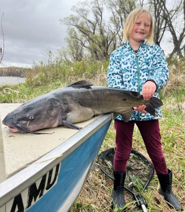 Danielle Peterson and a Master Angler channel catfish.