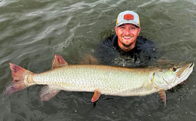 Brett Mauler with one of the musky he caught and released this summer.