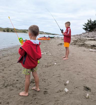 Brothers Johnny and Cooper Phillips fishing.