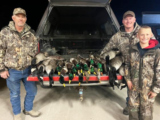 A memorable waterfowl field hunt for these three generations - Mike Peterson of Purdum and Dane and Teal Peterson of Mullen.
