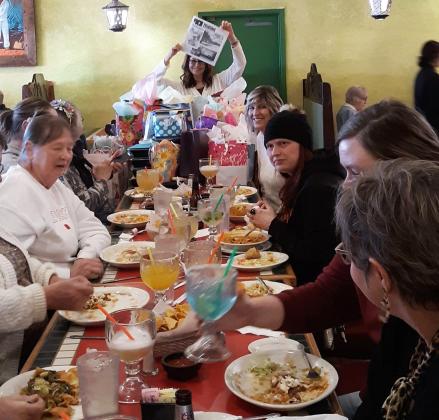 Terry Fisher of Amherst distributed the 2024 Vacationer Issue to her friends during their January/February birthday lunch at Margaritas in February. They were included in that issue from their 2023 girls tanking trip. Those present were Kathy, Janet, Billie, Paxie, Tova, Michele, Wendy, Ginny, BJ, Chelsea, Megan and Terry.