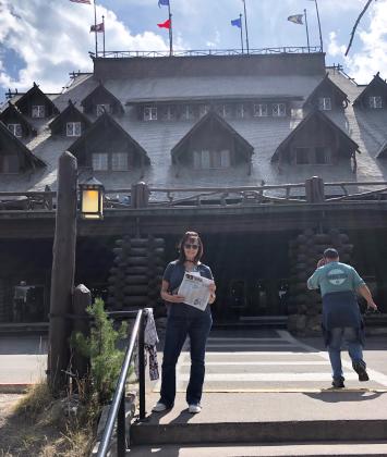 Terry Fisher took the Tribune to Yellowstone National Park in September. She is pictured at the Old Faithful Inn.