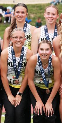 4x800 relay team on the podium - Ady, Harper, Riley, Peyton.