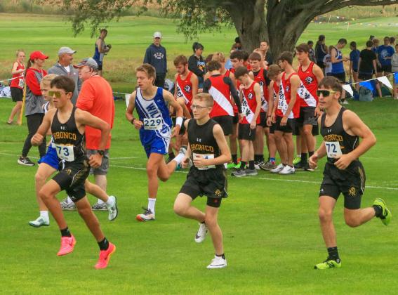 The high school boys warm up before last week’s race, l-r: Braylon Kuncl, Oakes Miller and Hunter Brown.