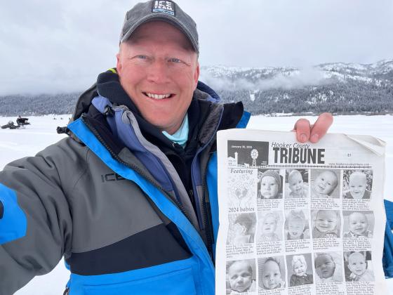 When you take a week-long vacation while your wife stays home to continue putting out the community newspaper, you better take a Vacationer Issue picture!!! Dane Peterson ice fishing on Cascade Lake in Cascade, Idaho.