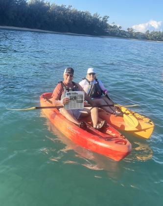 Dale and Pam Ginkens kayaking with the sea turtles at Kawela Bay on the North Shore of Oahu, Hawaii.
