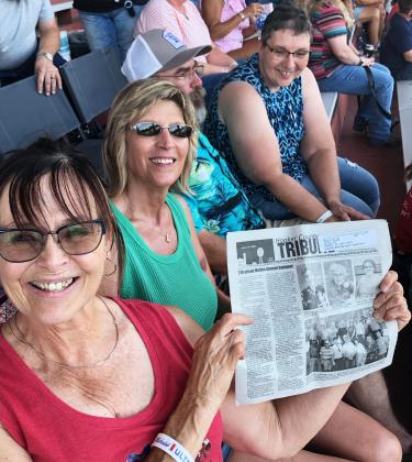 Terry Fisher took her Tribune with her to the Eric Church concert at Nebraskaland Days. Pictured l-r: Terry, Kathy, Marcus and Shannon.