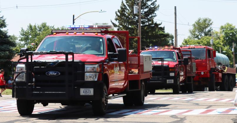 The Mullen Ambulances and Volunteer Firemen brought up the rear of the parade.