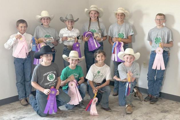 4-H horse competitors, back l-r: Grady Phipps, Audrabell Werth, Kendall Phipps, Hope Miller, Kaisley Phipps, Oakes Miller. Front: Zach Hicks, Tripp Jewell, Finley Mundorf, Duke Miller. Tami Miller