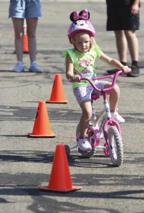 Ryann Walz competes in the poles of the Pre-k-kindergarten division of the Bicycle Rodeo.