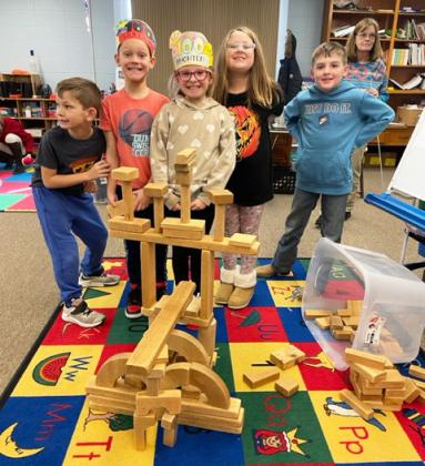 The 1st and 2nd grade students celebrated being in school for 100 days last week. They enjoyed a 100 day snack, built with 100 cups, built the tallest tower they could with 100 blocks, made a bridge with 100 snap cubes, read 100 words, colored 100 things and did a workout of 100 things. It was a fun 100th day!