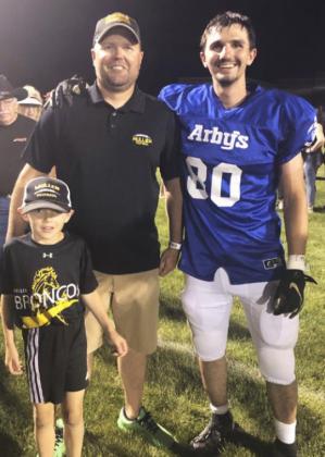Bryce with MHS Head Football Coach Wade Marsh and Kyler Marsh.