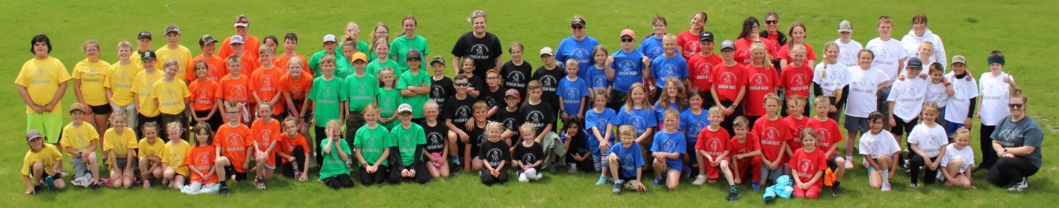 The Mullen Elementary Field Day was held last Tuesday, May 7. Pictured above in their team colors (which online subscribers can see) are students in grades K-6 who took part in the day.