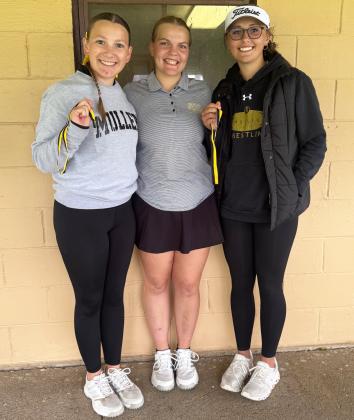 L-r: Hope Miller, Maci Walz and Austin Deibler at the Mullen Invite. Kelli Walz