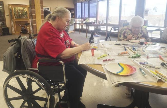 Ann Connell (left) and Nadene Andersen during crafts.
