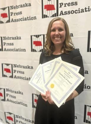 Gerri Peterson with her awards at the Nebraska Press Association’s Convention last Saturday.