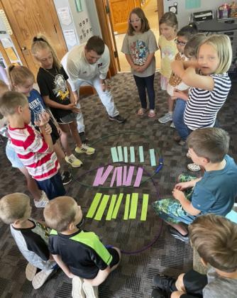 2nd graders studying tall tales