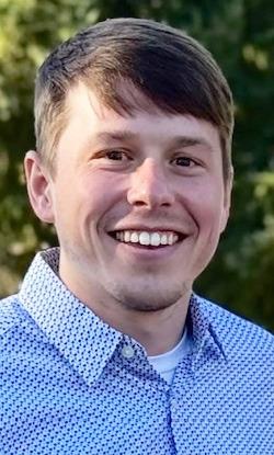 Evan Folk receives doctorate degree