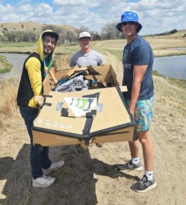 Last Wednesday, April 30 was the annual race of the cardboard boats. Juniors in Earth Science and seniors in Standards Science were challenged with engineering a two passenger boat made of only cardboard and one roll of duct tape. Three of seven boats made it across the pond with the winners, Jacob Wingebach, Justin French and Jarren Forsen (pictured above l-r), making it in 58 seconds. courtesy photos