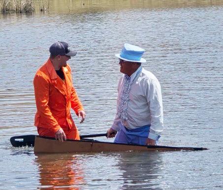 Mullen High School Principal Mr. Kvanvig (pictured above right), after being unable to make it across in his boat last year, attempted the challenge again with passenger Mullen Elementary Principal Mr. Mauler. They were unsuccessful... but Mr. Kvanvig had found the perfect suits for them to wear!