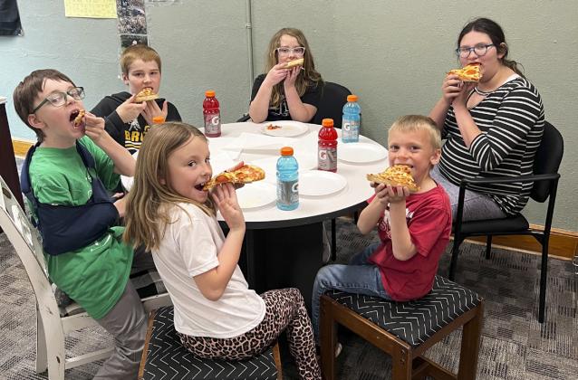 Clockwise around the table from the far back: Taylor Cash, Pandora Gray, Trent Cox, Sadie Hoyt, Samuel Hessin, Justin Kraus. Brett Mauler