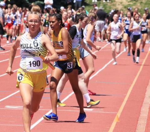 Riley Hegland starts her leg of the 4x800 relay, which placed 5th at State Track.