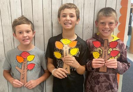 Emily Brown The 2nd and 3rd grade students made Thankful Trees. They added leaves to show the things they are thankful for. Pictured l-r: Holt Morrison, Tuff Pettit, Luke Cox.