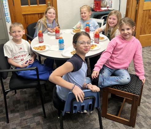 Pictured clockwise around the table from the left: Jaxson Barnes, Elle Gracey, Harper Myers, Marki Finney, Eve Ericksen, Keira Kearns. Brett Mauler